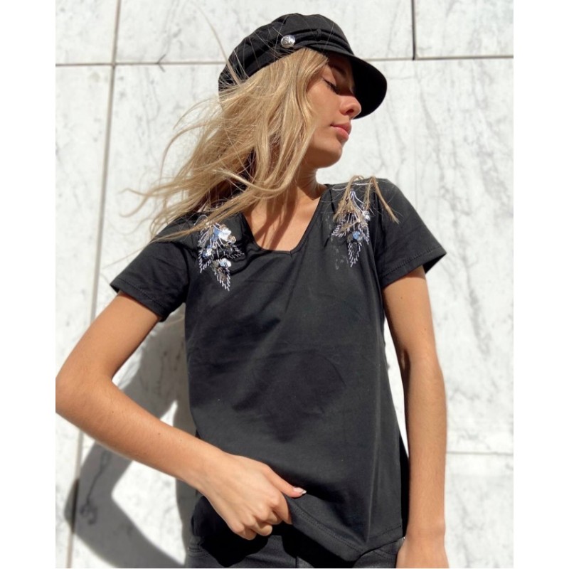 Remera Pluma Negra